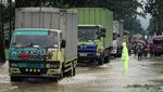 Banjir di Jalur Selatan Jawa Tengah, Bus dan Truk Terperosok