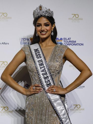 Newly crowned Miss Universe 2021 Harnaaz Sandhu poses during a press conference following the 70th Miss Universe pageant, Monday, Dec. 13, 2021, in Eilat, Israel. (AP Photo/Ariel Schalit)