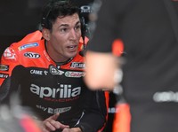 DOHA, QATAR - MARCH 05: Aleix Espargaro of Spain and Aprilia Racing speaks in box during the MotoGP of Qatar - Qualifying at Losail Circuit on March 05, 2022 in Doha, Qatar. (Photo by Mirco Lazzari gp/Getty Images,)