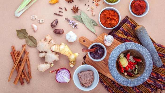 Assortment of Thai food Cooking ingredients and Paste of thai popular food red curry and green curry.