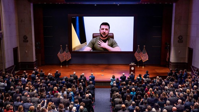 Ukrainian President Volodymyr Zelenskiy delivers a video address to senators and members of the House of Representatives gathered in the Capitol Visitor Center Congressional Auditorium, at the U.S. Capitol in Washington, U.S., March 16, 2022. J. Scott Applewhite/Pool via REUTERS