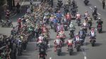 Melihat Lagi Momen Unik di MotoGP 2022: Ada Ojol Tos dengan Pebalap dari Pinggir Jalan