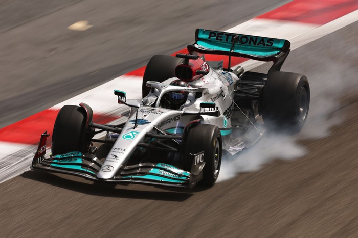 BAHRAIN, BAHRAIN - MARCH 11: George Russell of Great Britain driving the (63) Mercedes AMG Petronas F1 Team W13 locks a wheel under braking during Day Two of F1 Testing at Bahrain International Circuit on March 11, 2022 in Bahrain, Bahrain. (Photo by Lars Baron/Getty Images)