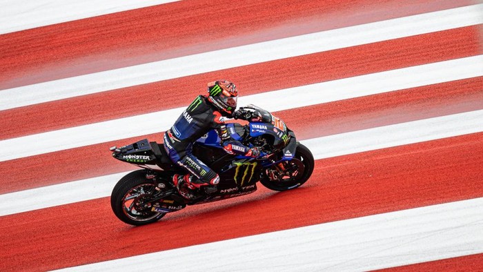 LOMBOK, INDONESIA - MARCH 19: MotoGP rider Fabio Quartararo #20 of France and Monster Energy Yamaha MotoGP™ rides during the free practice 3 of the MotoGP Grand Prix of Indonesia at Mandalika International Street Circuit on March 19, 2022 in Lombok, Indonesia. (Photo by Robertus Pudyanto/Getty Images)