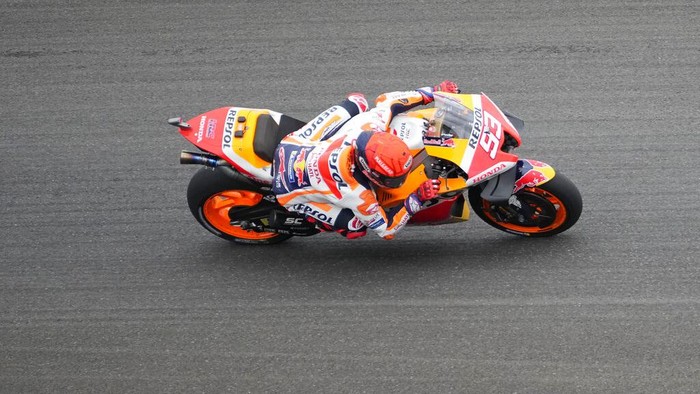 Spanish rider Marc Marquez of the Repsol Honda team, right, look to Italian rider Francesco Bagnia of Ducati Lenovo Team, left, during third free practice at Pertamina Mandalika Circuit in Mandalika, Lombok Island, Indonesia, Saturday, March 19, 2022. (AP Photo/Achmad Ibrahim)
