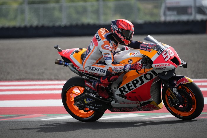 Spanish rider Marc Marquez of the Repsol Honda team rides his motorbike during second free practice at Pertamina Mandalika Circuit in Mandalika, Lombok Island, Indonesia, Friday, March 18, 2022. (AP Photo/Achmad Ibrahim)