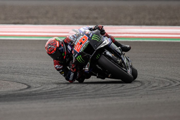 LOMBOK, INDONESIA - MARCH 19: MotoGP rider Fabio Quartararo #20 of France and Monster Energy Yamaha MotoGP™ competes during the qualifying round of the MotoGP Grand Prix of Indonesia at Mandalika International Street Circuit on March 19, 2022 in Lombok, Indonesia. (Photo by Robertus Pudyanto/Getty Images)