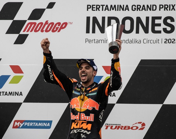 LOMBOK, INDONESIA - MARCH 20: MotoGP rider Miguel Oliveira #88 of Portugal and Red Bull KTM Factory Racing celebrates with the trophy during the victory ceremony after winning the MotoGP Grand Prix of Indonesia at Mandalika International Street Circuit on March 20, 2022 in Lombok, Indonesia. (Photo by Robertus Pudyanto/Getty Images)