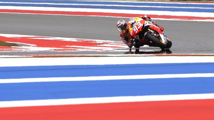 Marc Marquez of Spain, takes a turn during open practice for the Texas MotoGP at the Circuit of the Americas Friday, April 19, 2013, in Austin, Texas.  (AP Photo/LM Otero)