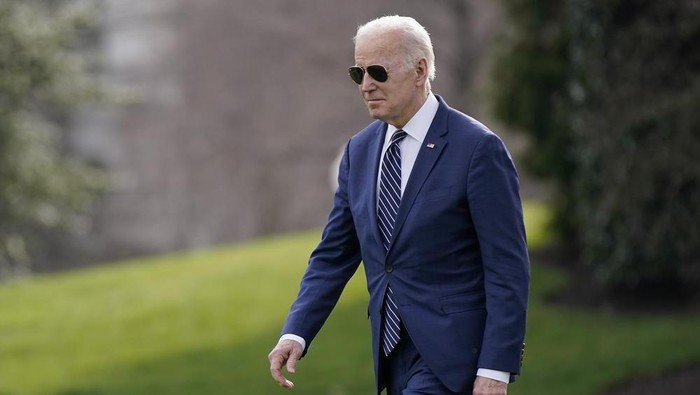 President Joe Biden walks on the South Lawn of the White House before boarding Marine One, Friday, March 18, 2022, in Washington. Biden is spending the weekend at his home in Rehoboth Beach, Del. (AP Photo/Patrick Semansky)