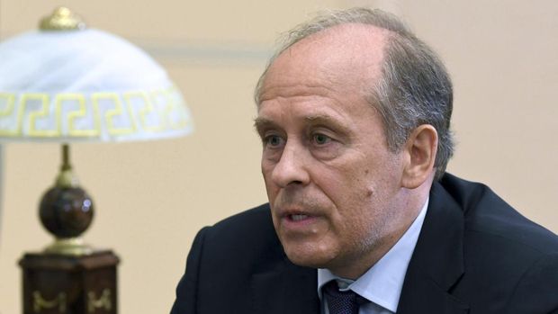 Federal Security Service (FSB) director Alexander Bortnikov speaks to Russian President Vladimir Putin during their meeting at the Novo-Ogaryovo residence outside Moscow, Russia, Tuesday, June 16, 2020. (Alexei Nikolsky, Sputnik, Kremlin Pool Photo via AP)