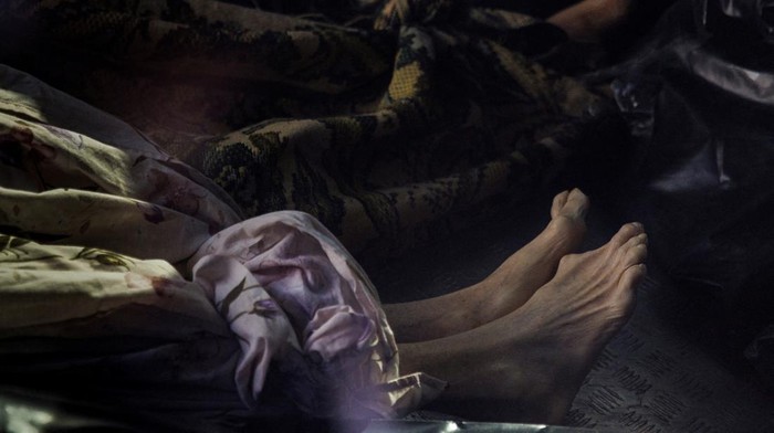 Korban Perang Ukraina Diangkut Untuk Dikremasi SENSITIVE MATERIAL. THIS IMAGE MAY OFFEND OR DISTURB A priest blesses the bodies of unidentified people at a crematorium, who were killed during Russia's attack on Ukraine and were picked up by a volunteer from Hostomel, in Kyiv, Ukraine, March 20, 2022. REUTERS/Thomas Peter