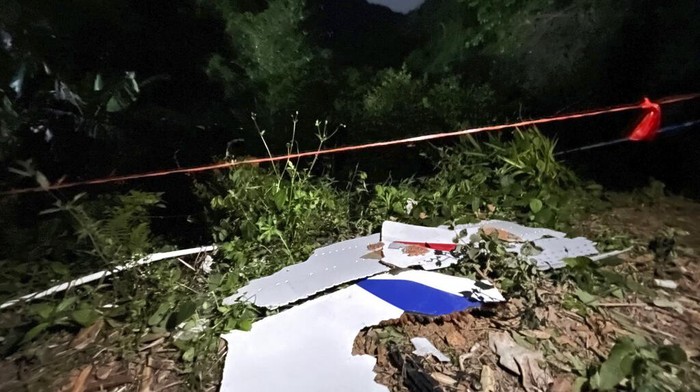 In this photo released by Chinas Xinhua News Agency, debris is seen at the site of a plane crash in Tengxian County in southern Chinas Guangxi Zhuang Autonomous Region, Tuesday, March 22, 2022. A China Eastern Boeing 737-800 with more than 100 people on board crashed in a remote mountainous area of southern China on Monday, officials said, setting off a forest fire visible from space in the countrys worst air disaster in nearly a decade. (Zhou Hua/Xinhua via AP)