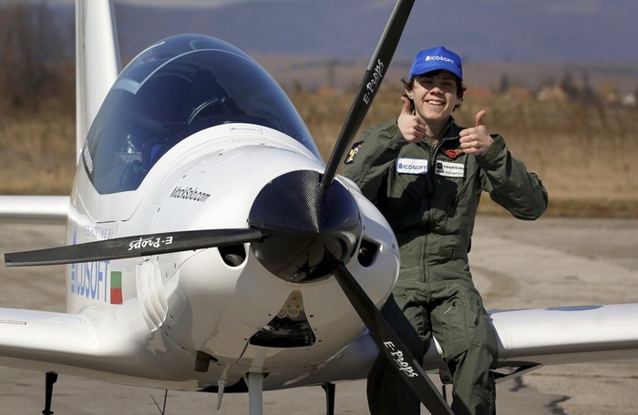 Mack Rutherford, 16 prepares his plane prior to his departure to attempt to fly solo across the world at Sofia-West airport, in Sofia, Wednesday, March 23, 2022. A Belgian-British teenage pilot hopes to join his sister in the record books after starting his attempt to become the youngest person to fly around the world solo in a small plane on Wednesday. (AP Photo/Valentina Petrova)