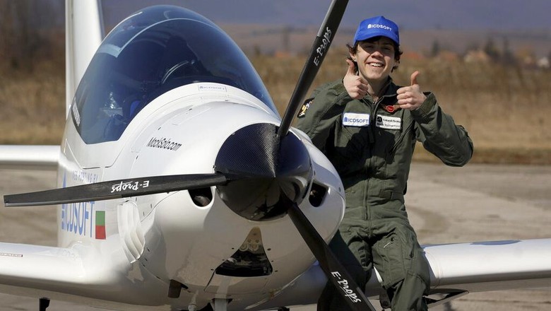 Mack Rutherford, 16 prepares his plane prior to his departure to attempt to fly solo across the world at Sofia-West airport, in Sofia, Wednesday, March 23, 2022. A Belgian-British teenage pilot hopes to join his sister in the record books after starting his attempt to become the youngest person to fly around the world solo in a small plane on Wednesday. (AP Photo/Valentina Petrova)