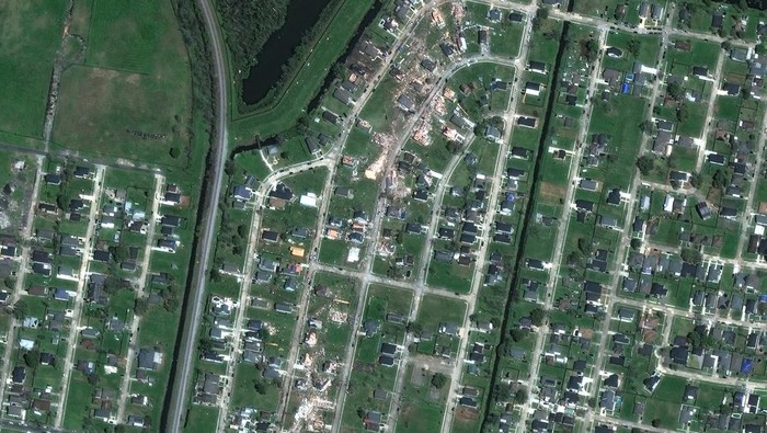 A satellite image shows damaged homes in the aftermath of a tornado in the Arabi neighborhood of New Orleans, Louisiana, U.S. March 23, 2022. Satellite image ©2022 Maxar Technologies/Handout via REUTERS