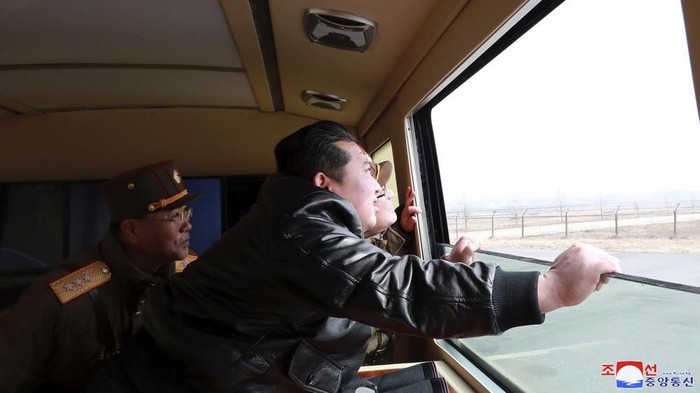 In this photo distributed by the North Korean government, North Korean leader Kim Jong Un watches what it says a test-fire of a Hwasong-17 intercontinental ballistic missile (ICBM), at an undisclosed location in North Korea on March 24, 2022. Independent journalists were not given access to cover the event depicted in this image distributed by the North Korean government. The content of this image is as provided and cannot be independently verified. Korean language watermark on image as provided by source reads: 
