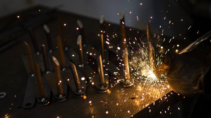 A Ukrainian welder builds a tyre deflation stringer spike system in Lviv, western Ukraine in Lviv. Russias war on Ukraine is now in its third week, the war has expanded to areas in western Ukraine, closer to NATO members Poland and Romania. The war has forced more than 2.5 million people to flee Ukraine. (AP Photo/Bernat Armangue)