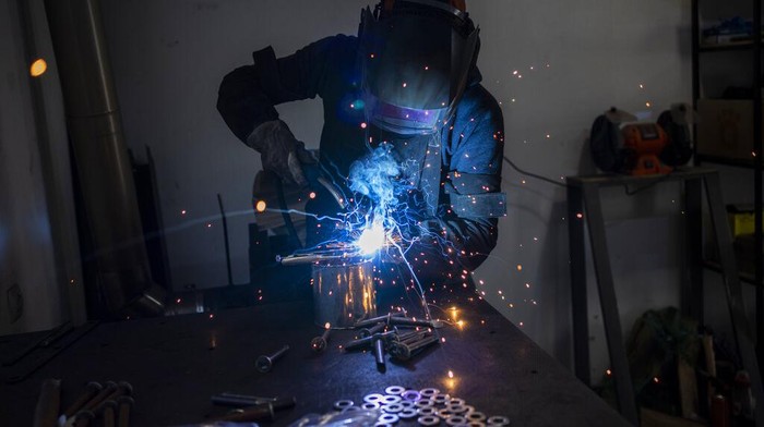 A Ukrainian welder builds a tyre deflation stringer spike system in Lviv, western Ukraine in Lviv. Russias war on Ukraine is now in its third week, the war has expanded to areas in western Ukraine, closer to NATO members Poland and Romania. The war has forced more than 2.5 million people to flee Ukraine. (AP Photo/Bernat Armangue)