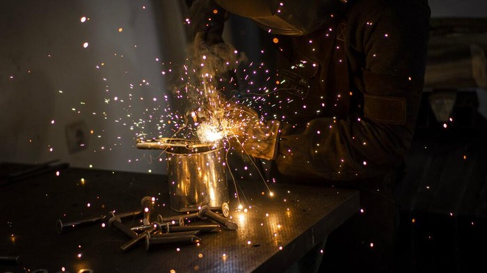 A Ukrainian welder builds a tyre deflation stringer spike system in Lviv, western Ukraine in Lviv. Russias war on Ukraine is now in its third week, the war has expanded to areas in western Ukraine, closer to NATO members Poland and Romania. The war has forced more than 2.5 million people to flee Ukraine. (AP Photo/Bernat Armangue)