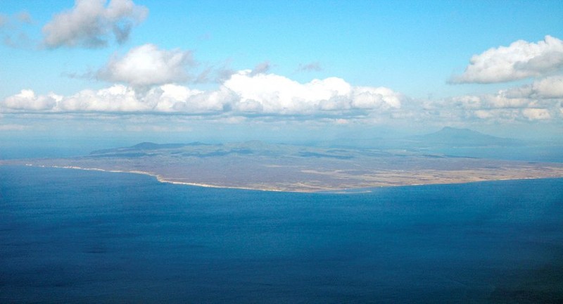 An aerial view shows Kunashiri Island, one of four islands known as the Southern Kuriles in Russia and Northern Territories in Japan, is seen in this photo taken 2005. REUTERS/Kyodo