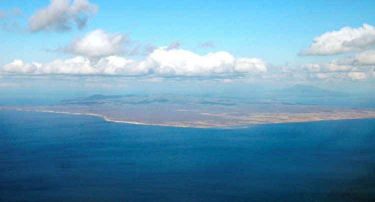 Ilustrasi -- Pulau Kunashiri, salah satu dari empat pulau dari gugusan Kepulauan Kuril yang menjadi sengketa Rusia dan Jepang An aerial view shows Kunashiri Island, one of four islands known as the Southern Kuriles in Russia and Northern Territories in Japan, is seen in this photo taken 2005. REUTERS/Kyodo