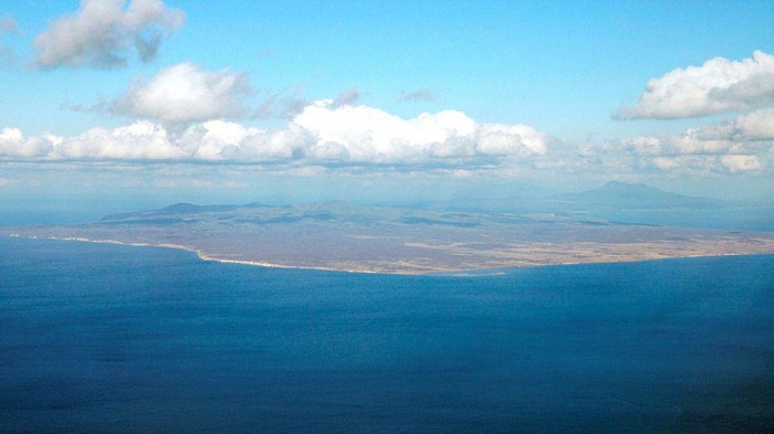 An aerial view shows Kunashiri Island, one of four islands known as the Southern Kuriles in Russia and Northern Territories in Japan, is seen in this photo taken 2005. REUTERS/Kyodo