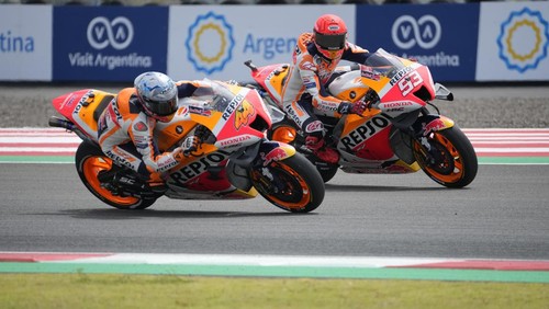 Spanish rider Marc Marquez, right, and Pol Espargaro of Repsol Honda Team ride during a warmup in the Pertamina Grand Prix of Indonesia motorcycle racing at the Pertamina Mandalika Circuit in Mandalika, Lombok Island, Indonesia, Sunday, March 20, 2022. (AP Photo/Achmad Ibrahim)