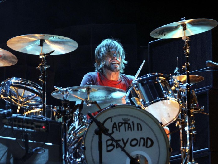 LONDON - JULY 07:  Taylor Hawkins of American rock band Foo Fighters plays with the SOS Allstars on stage during the Live Earth concert held at Wembley Stadium on July 7, 2007 in London. Live Earth is a 24-hour, 7-continent concert series taking place on 7/7/07, bringing together more than 100 music artists and 2 billion people to trigger a global movement to solve the climate crisis.  (Photo by Gareth Cattermole/Getty Images)