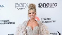 Oscar 2022 diselenggarakan pada Minggu (27/3) waktu setempat dan dihadiri oleh banyak aktris seperti Heidi Klum yang tampil seksi dengan gaun silver. Getty Images via AFP/JAMIE MCCARTHY