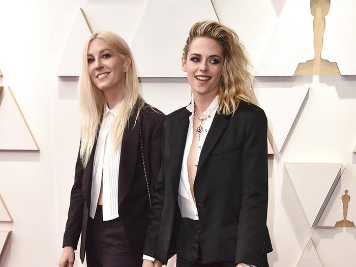 Dylan Meyer, left, and Kristen Stewart arrive at the Oscars on Sunday, March 27, 2022, at the Dolby Theatre in Los Angeles. (Photo by Jordan Strauss/Invision/AP)
