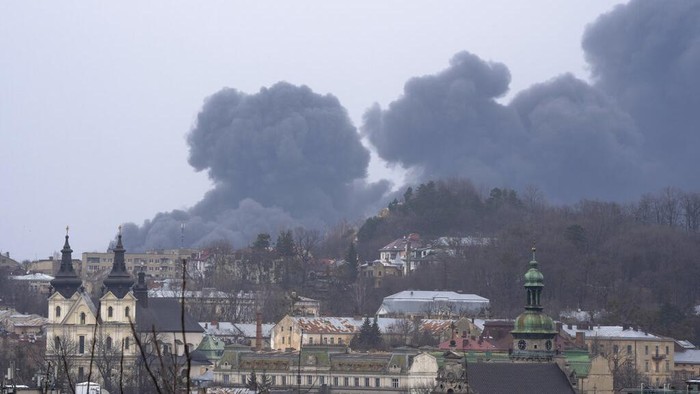 Smoke rises in the air in Lviv, western Ukraine, Saturday, March 26, 2022. With Russia continuing to strike and encircle urban populations, from Chernihiv and Kharkiv in the north to Mariupol in the south, Ukrainian authorities said Saturday that they cannot trust statements from the Russian military Friday suggesting that the Kremlin planned to concentrate its remaining strength on wresting the entirety of Ukraines eastern Donbas region from Ukrainian control. (AP Photo/Nariman El-Mofty)