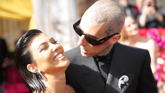 Travis Barker Kourtney Kardashian, left, and Travis Barker arrive at the Oscars on Sunday, March 27, 2022, at the Dolby Theatre in Los Angeles. (AP Photo/John Locher)
