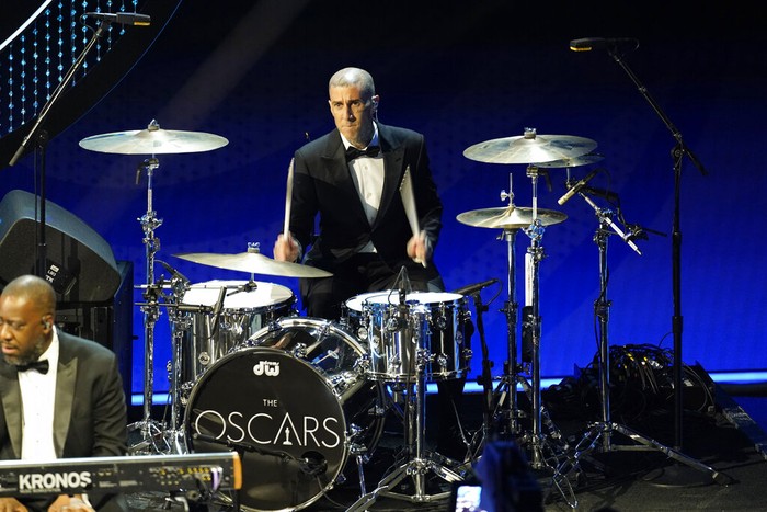 Travis Barker Travis Barker performs at the Oscars on Sunday, March 27, 2022, at the Dolby Theatre in Los Angeles. (AP Photo/Chris Pizzello)