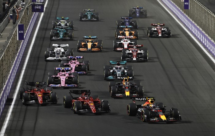 Formula One F1 - Saudi Arabia Grand Prix - Jeddah Corniche Circuit, Jeddah, Saudi Arabia - March 27, 2022 Red Bulls Max Verstappen celebrates on the podium with the trophy after winning the race REUTERS/Hamad I Mohammed