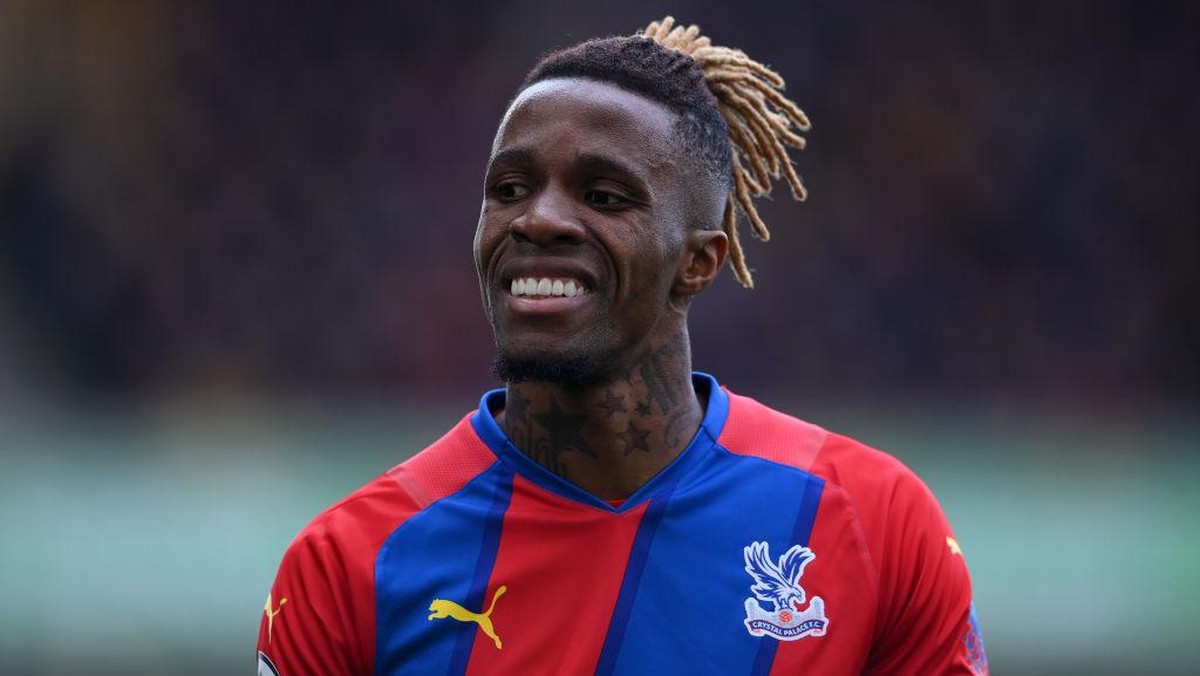 Zaha menghabiskan seluruh karier sepakbolanya di Inggris, namun membela Pantai Gading di level internasional. Foto: Getty Images/Laurence Griffiths