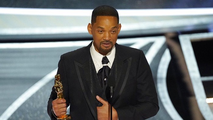 Will Smith cries as he accepts the award for best performance by an actor in a leading role for King Richard at the Oscars on Sunday, March 27, 2022, at the Dolby Theatre in Los Angeles. (AP Photo/Chris Pizzello)