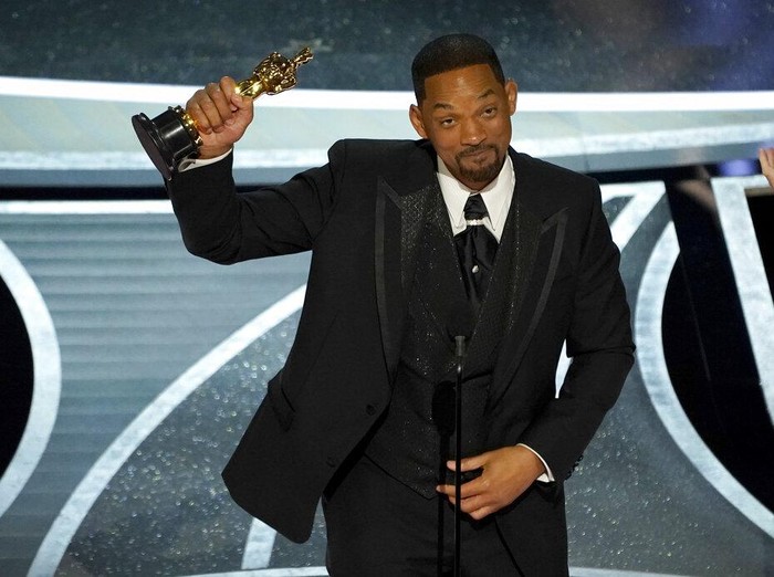 Will Smith cries as he accepts the award for best performance by an actor in a leading role for King Richard at the Oscars on Sunday, March 27, 2022, at the Dolby Theatre in Los Angeles. (AP Photo/Chris Pizzello)