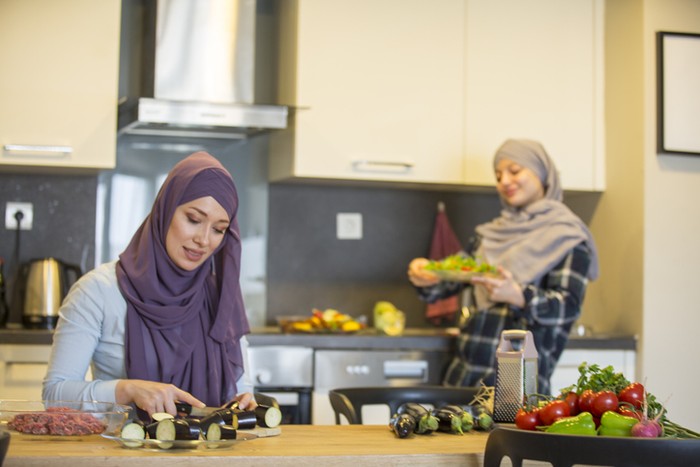 Festive traditional Middle Eastern Muslim Halal food on the table. Celebration of Eid al-Adha, Feast of Sacrifice