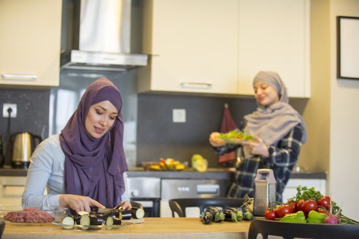 Festive traditional Middle Eastern Muslim Halal food on the table. Celebration of Eid al-Adha, Feast of Sacrifice