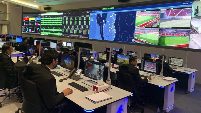 People work in the command center in that will be at the heart of World Cup operations in Doha, Qatar, Monday, March 28, 2022. All is quiet and calm now. By November, this command center will be at the heart of World Cup operations. The Associated Press has had a first look inside one of the key locations overseeing security and logistics for the most high-profile sporting event to be staged in the Middle East. (AP Photo/Rob Harris)