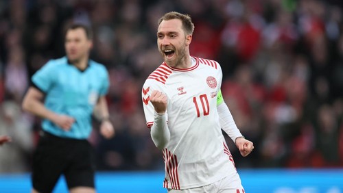 COPENHAGEN, DENMARK - MARCH 29: Christian Eriksen of Denmark celebrates their sides second goal scored by Jesper Lindstrom of Denmark (not pictured) during the international friendly match between Denmark and Serbia at Parken Stadium on March 29, 2022 in Copenhagen, Denmark. (Photo by Martin Rose/Getty Images)