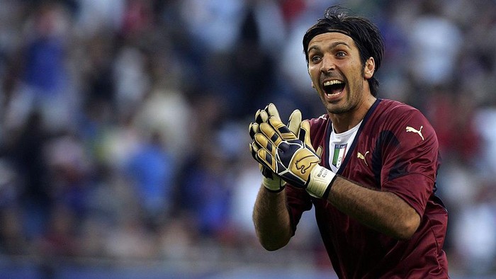 HAMBURG, GERMANY - JUNE 30:  Goalkeeper Gianluigi Buffon of Italy celebrates after teammate, Gianluci Zambrotta scores the opening goal during the FIFA World Cup Germany 2006 Quarter-final match between Italy and Ukraine at the Stadium Hamburg on June 30, 2006 in Hamburg, Germany.
  (Photo by Ben Radford/Getty Images)