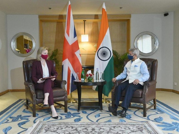 In this photo provided by Indian Foreign Minister S. Jaishankars Twitter handle, Jaishankar, right and Britains Foreign Secretary Liz Truss meet before their discussions in New Delhi, India, Thursday, March 31, 2022. (Indian Foreign Minister S. Jaishankars Twitter handle via AP)