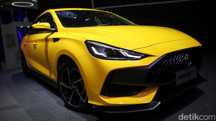 Si Kuning Morris Garage 5 GT Dijual Mulai Rp 339,9 Juta Brand mobil Inggris Morris Garage akhirnya mengumumkan harga jual MG 5 GT pada ajang Indonesia International Motor Show (IIMS) Hybrid 2022. Mobil bergaya Coupe 4 pintu yang sudah diperkenalkan sejak tahun ini akhirnya dijual mulai Rp 339,9 juta.