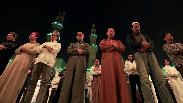 A Muslim worshipper cries after evening prayers called 