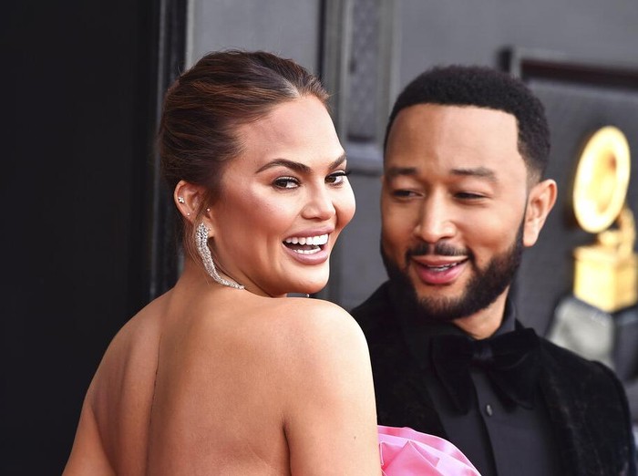 Chrissy Teigen arrives at the 64th Annual Grammy Awards at the MGM Grand Garden Arena on Sunday, April 3, 2022, in Las Vegas. (Photo by Jordan Strauss/Invision/AP)