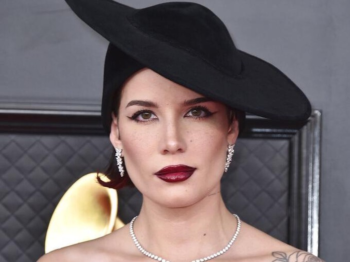 Halsey arrives at the 64th Annual Grammy Awards at the MGM Grand Garden Arena on Sunday, April 3, 2022, in Las Vegas. (Photo by Jordan Strauss/Invision/AP)