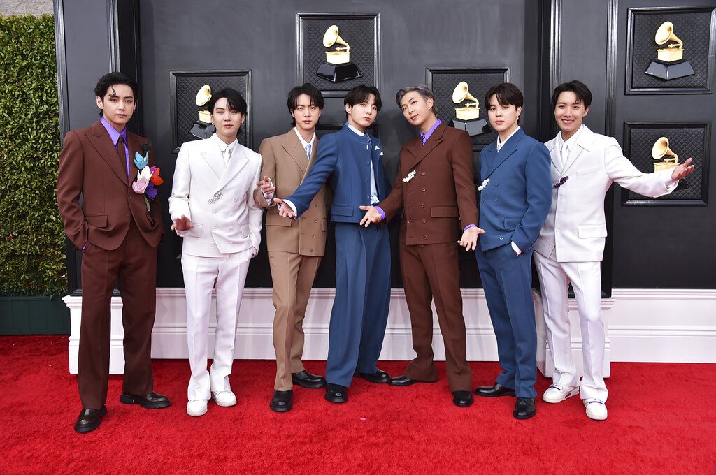 BTS arrives at the 64th Annual Grammy Awards at the MGM Grand Garden Arena on Sunday, April 3, 2022, in Las Vegas. (Photo by Jordan Strauss/Invision/AP)