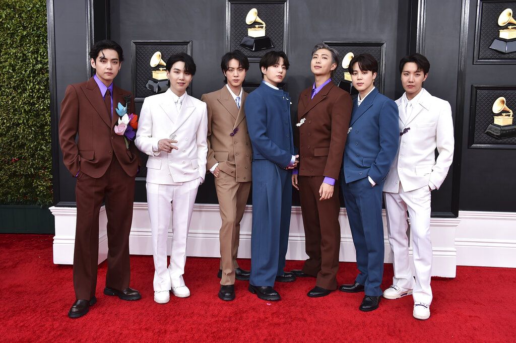 BTS arrives at the 64th Annual Grammy Awards at the MGM Grand Garden Arena on Sunday, April 3, 2022, in Las Vegas. (Photo by Jordan Strauss/Invision/AP)
